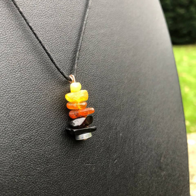 Amber & Jet adjustable necklace with upcycled headphone magnet